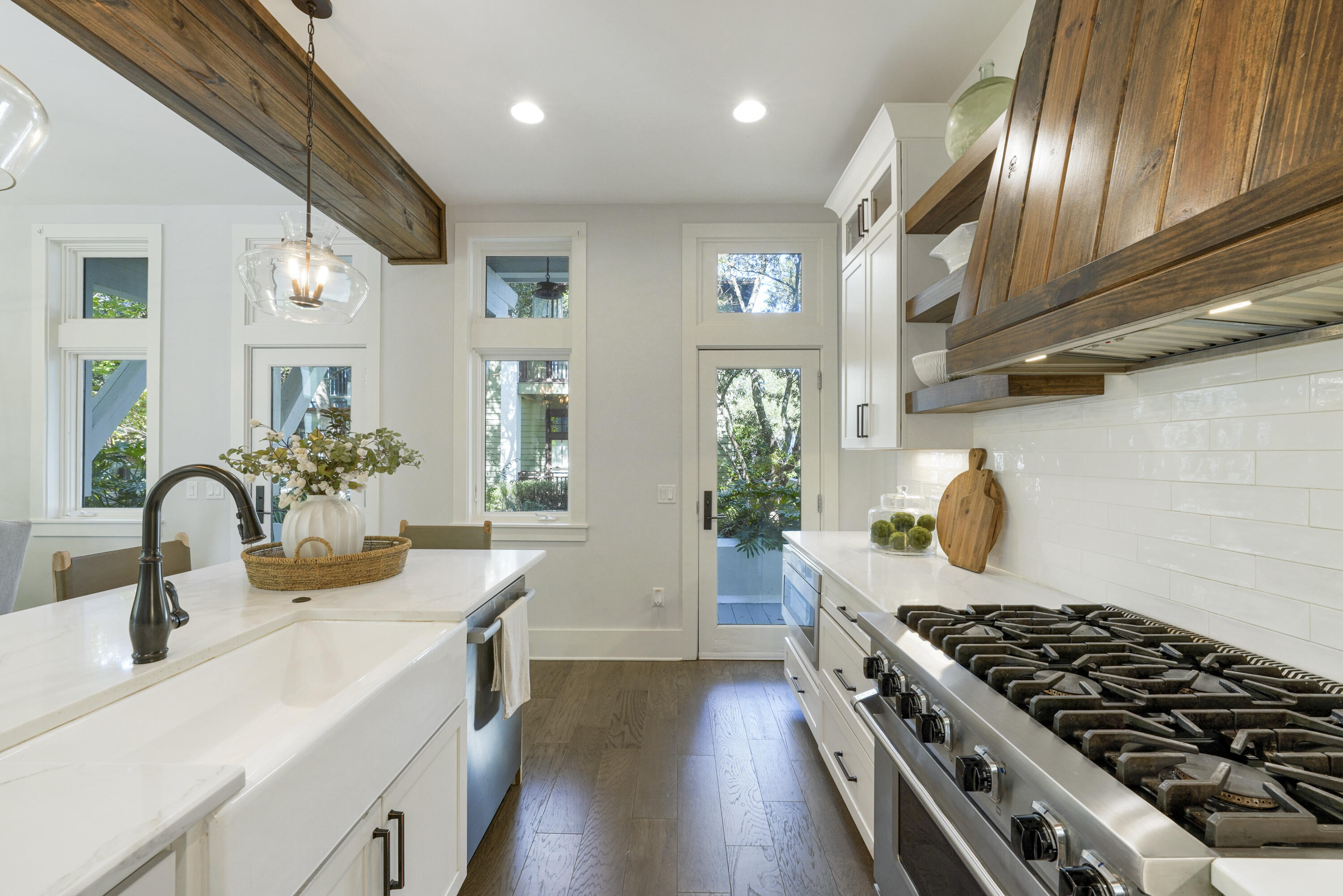 18 Bourne Lane Inlet Beach, FL 32461 - Photo 22 of 81 a kitchen with granite countertop a stove and a sink