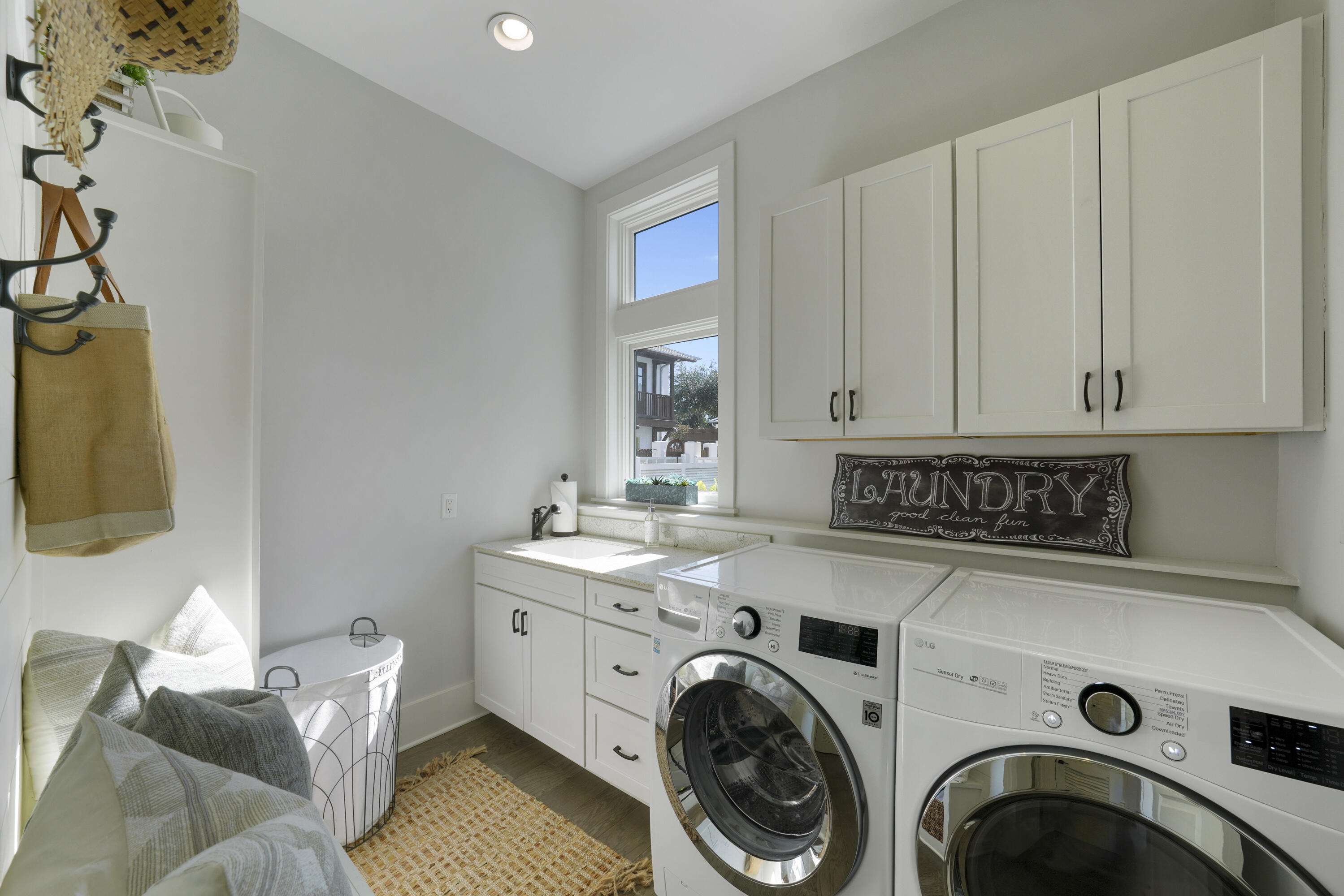18 Bourne Lane Inlet Beach, FL 32461 - Photo 28 of 81 a view of washer and dryer with kitchen in the background