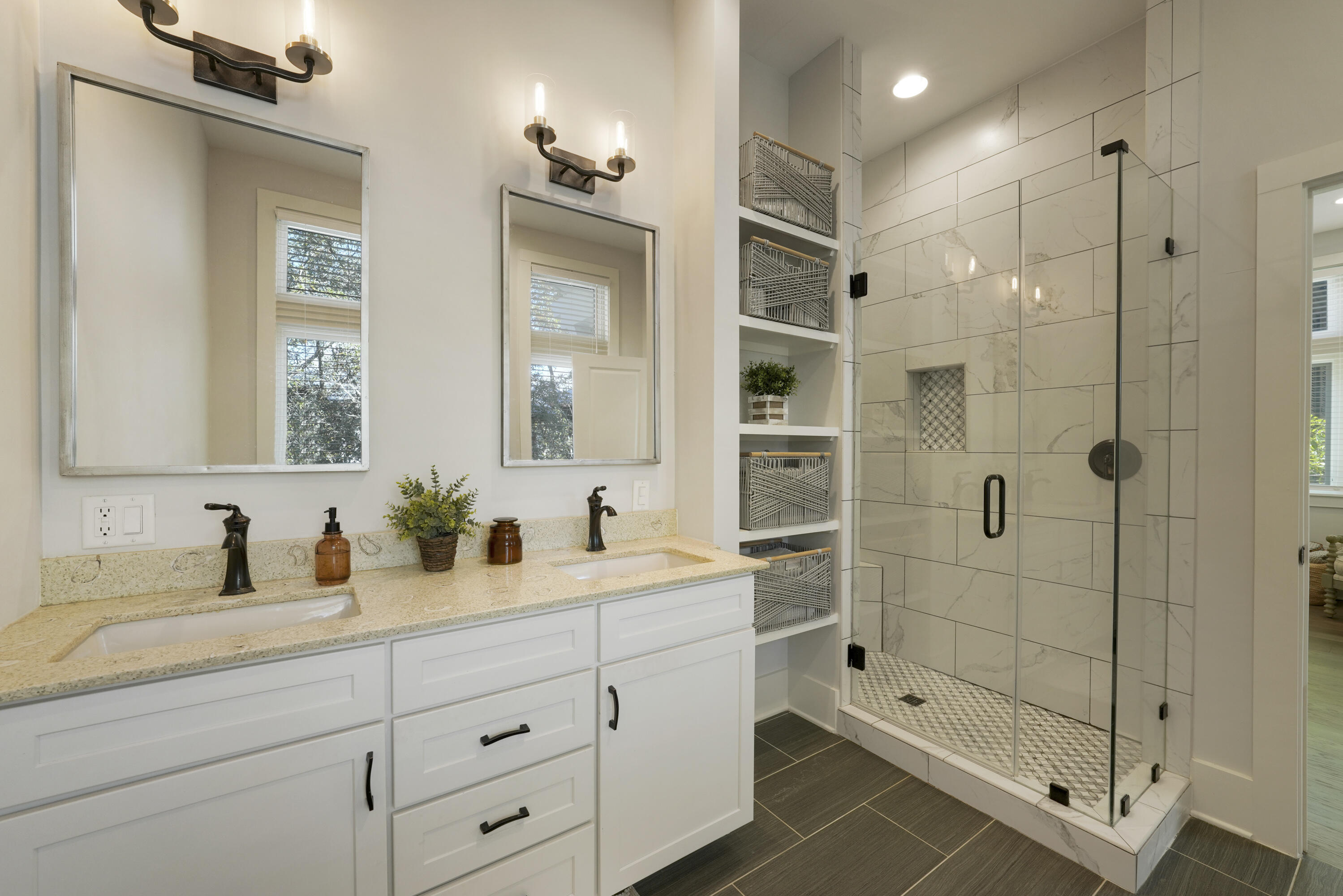 18 Bourne Lane Inlet Beach, FL 32461 - Photo 32 of 81 a bathroom with a shower sink and mirror