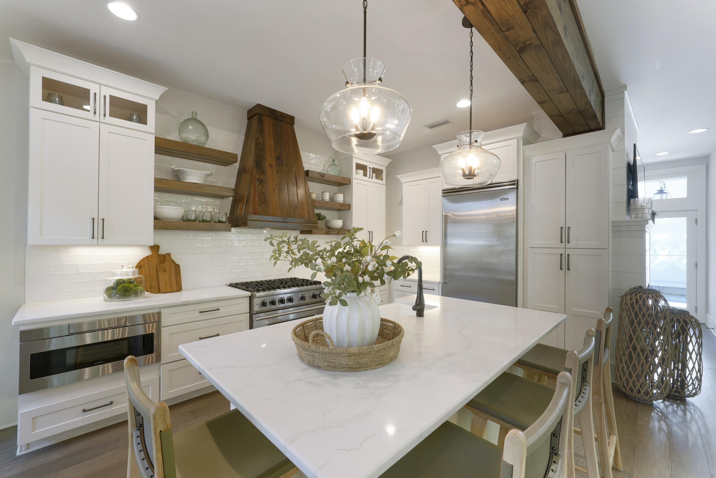 18 Bourne Lane Inlet Beach, FL 32461 - Photo 4 of 81 a kitchen with a table and chairs in it