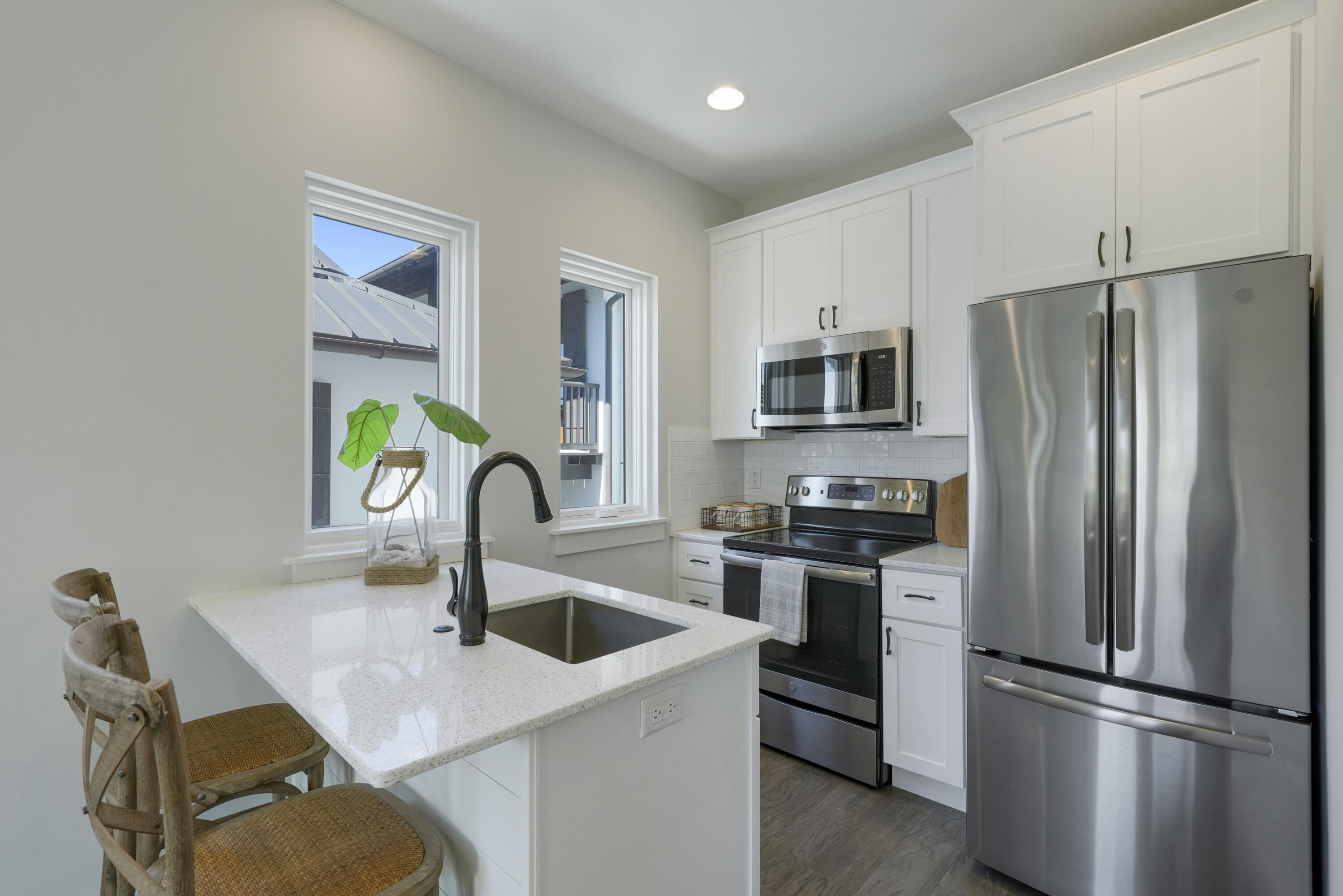 18 Bourne Lane Inlet Beach, FL 32461 - Photo 54 of 81 a kitchen with stainless steel appliances granite countertop a refrigerator sink and stove