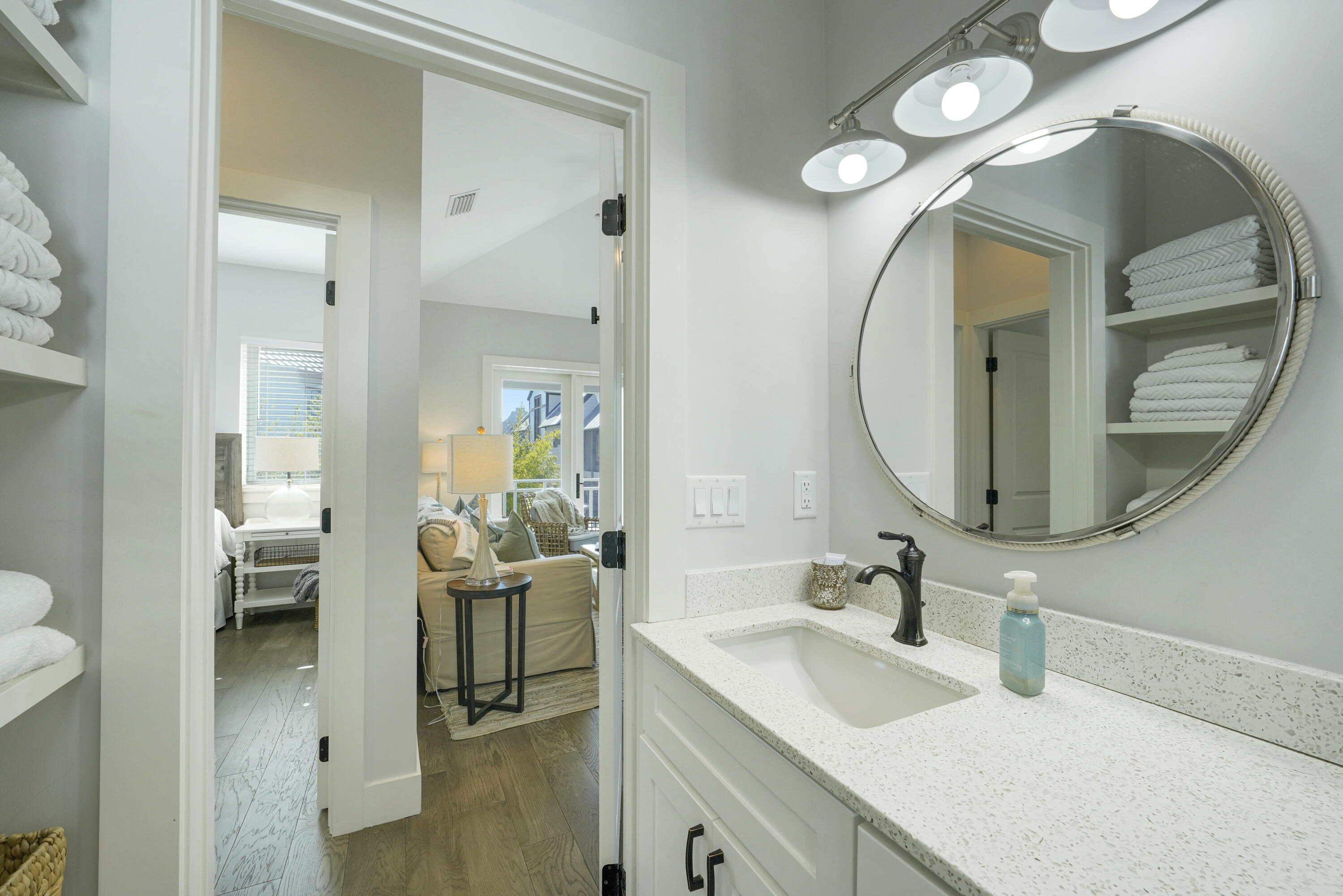 18 Bourne Lane Inlet Beach, FL 32461 - Photo 57 of 81 a en suite bathroom with a double vanity sink and a mirror