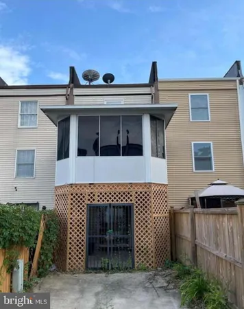 a front view of a house with a garage