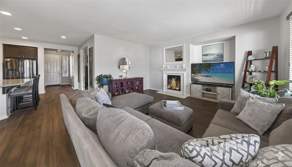 1433 Fall Brook Road Beaumont, CA 92223 - Photo 14 of 33 a living room with furniture and a fireplace