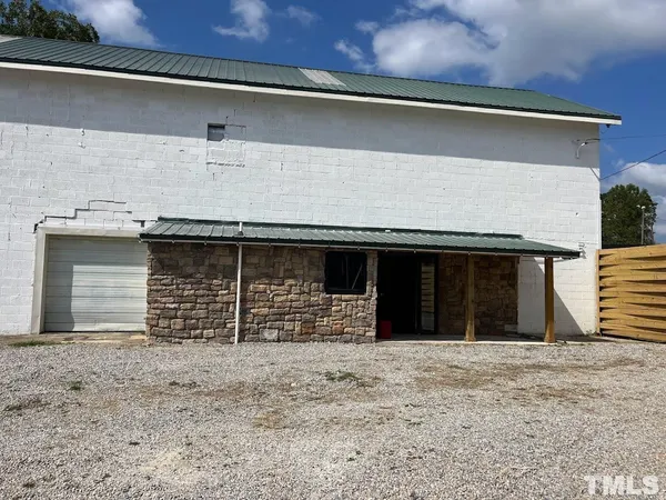 a view of a house with a garage