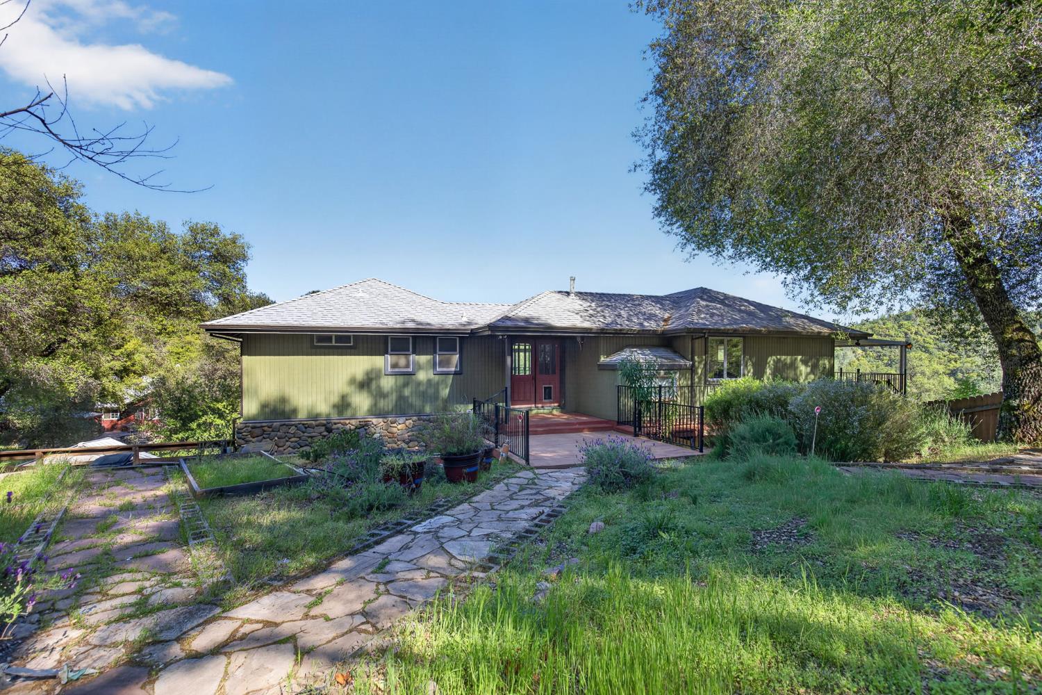 4450 Cosumnes View Trail Placerville, CA 95667 - Photo 45 of 69 a view of a house with a yard and sitting area