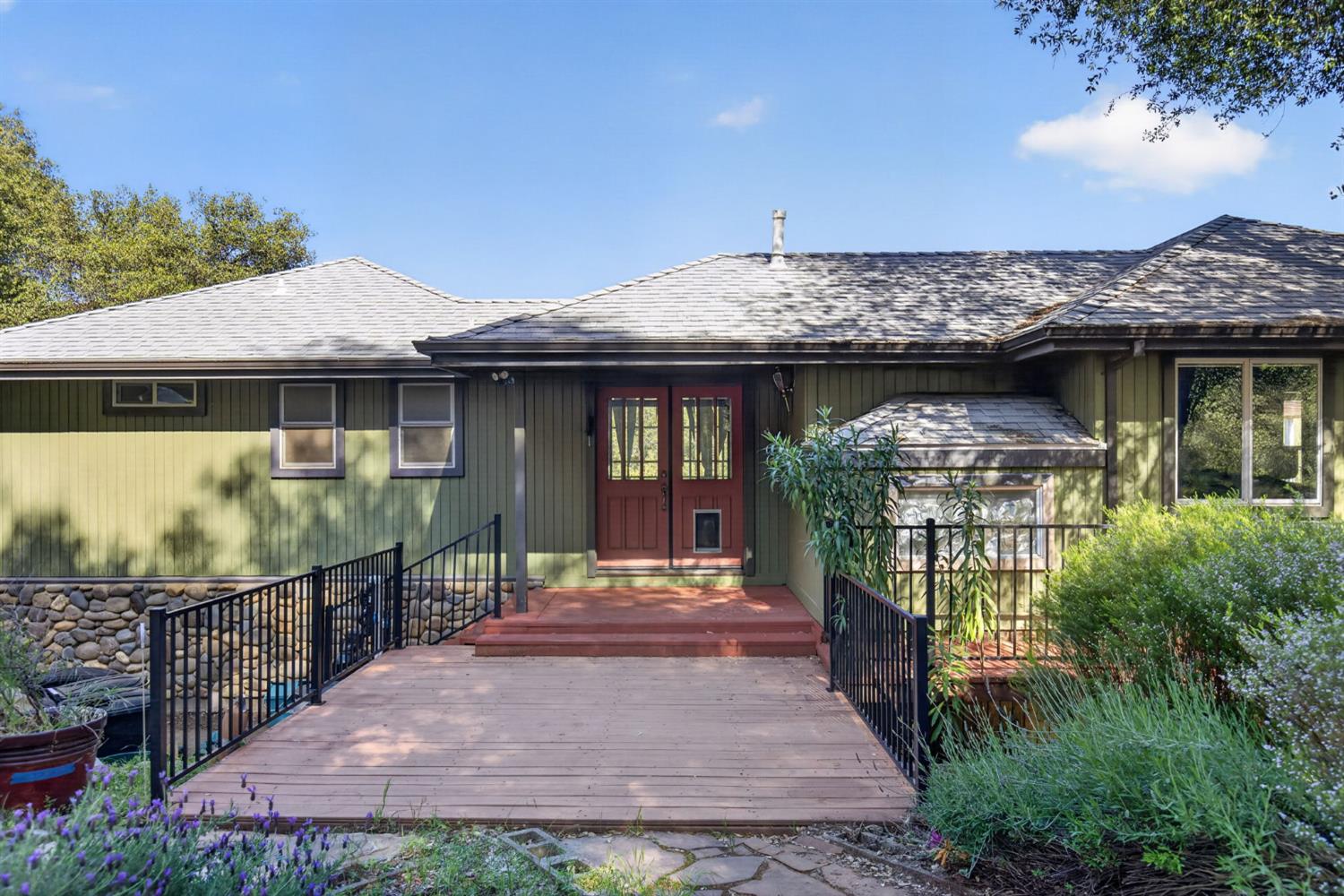 4450 Cosumnes View Trail Placerville, CA 95667 - Photo 47 of 69 a front view of a house with a garden