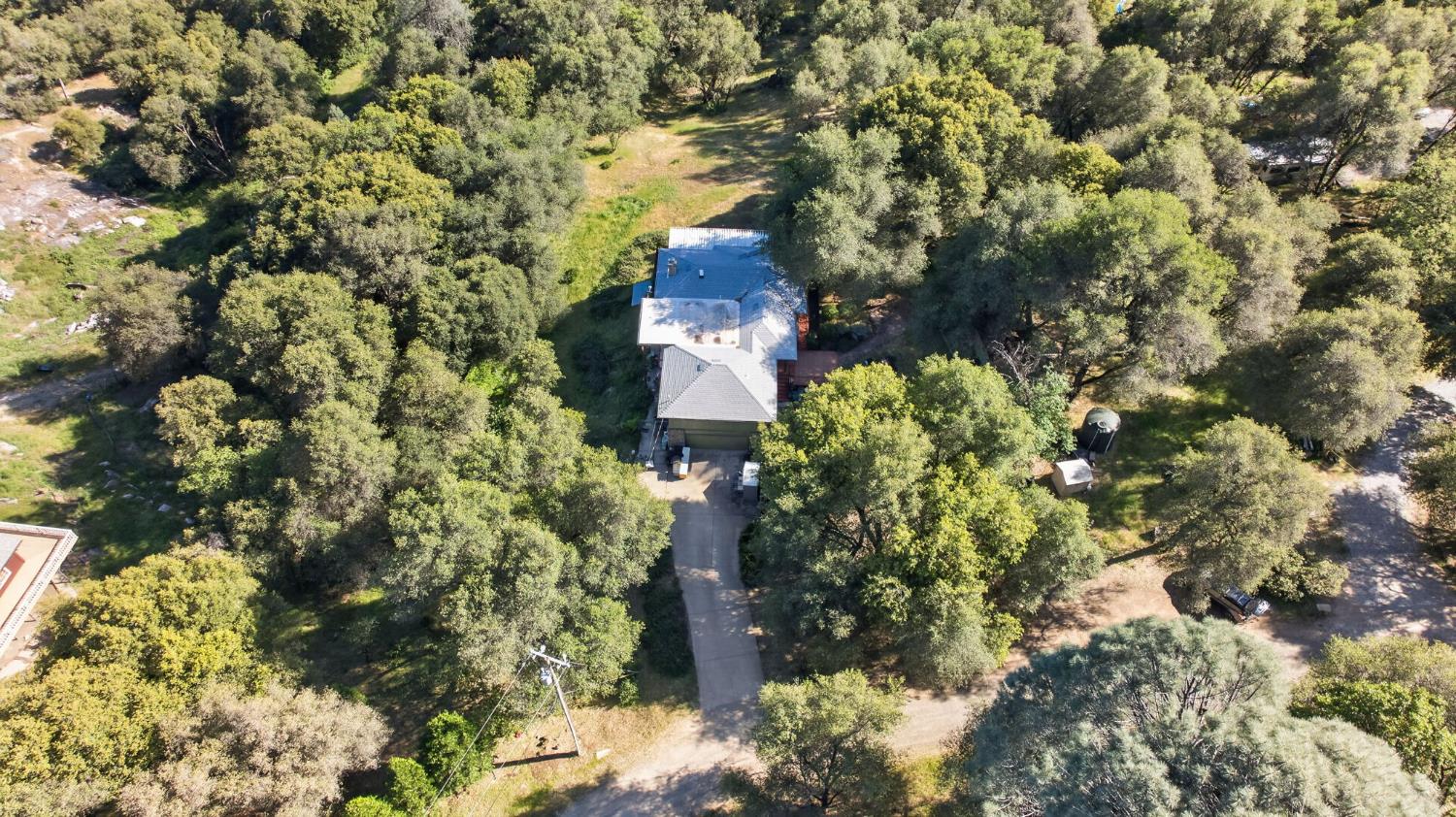 4450 Cosumnes View Trail Placerville, CA 95667 - Photo 53 of 69 a view of a house with a tree