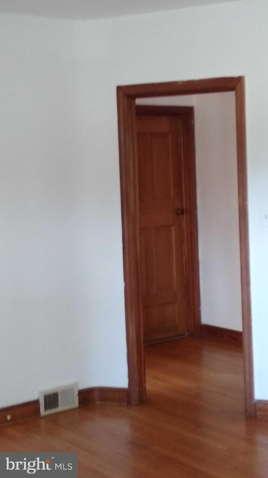 9908 Rocky Ridge Road Rocky Ridge, MD 21778 - Photo 11 of 17 Living Room to Hall