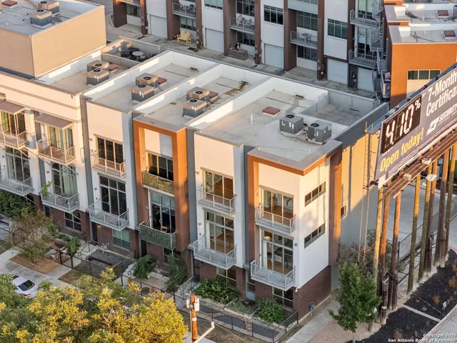 a view of a building with a window and balcony