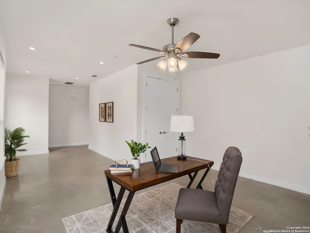 a view of a dining room with furniture