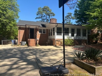 1513 Raeford Road Fayetteville, NC 28305 - Photo 25 of 25 a front view of a house with garden