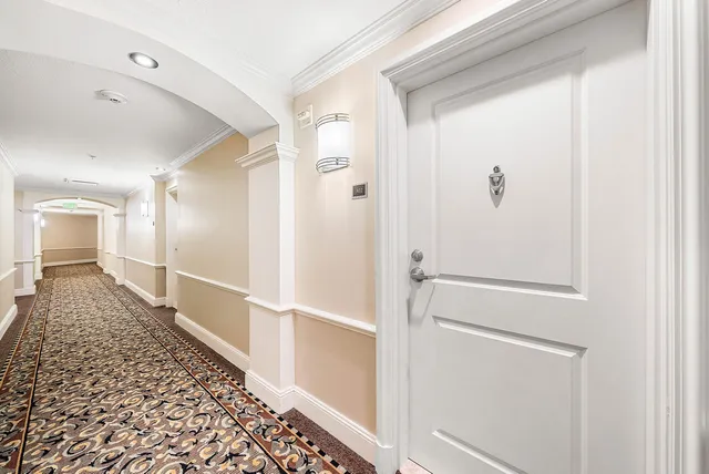 a bathroom with a shower and a sink