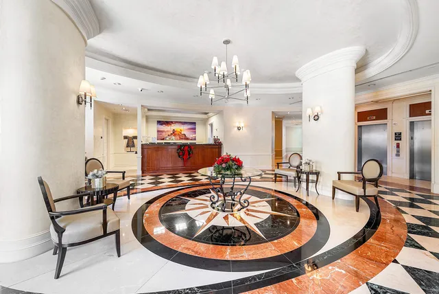 a room with furniture and view of living room