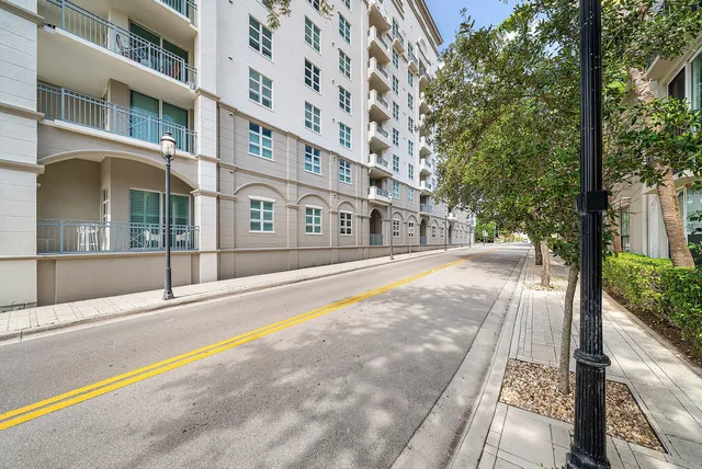 a view of an buildings with a swimming pool