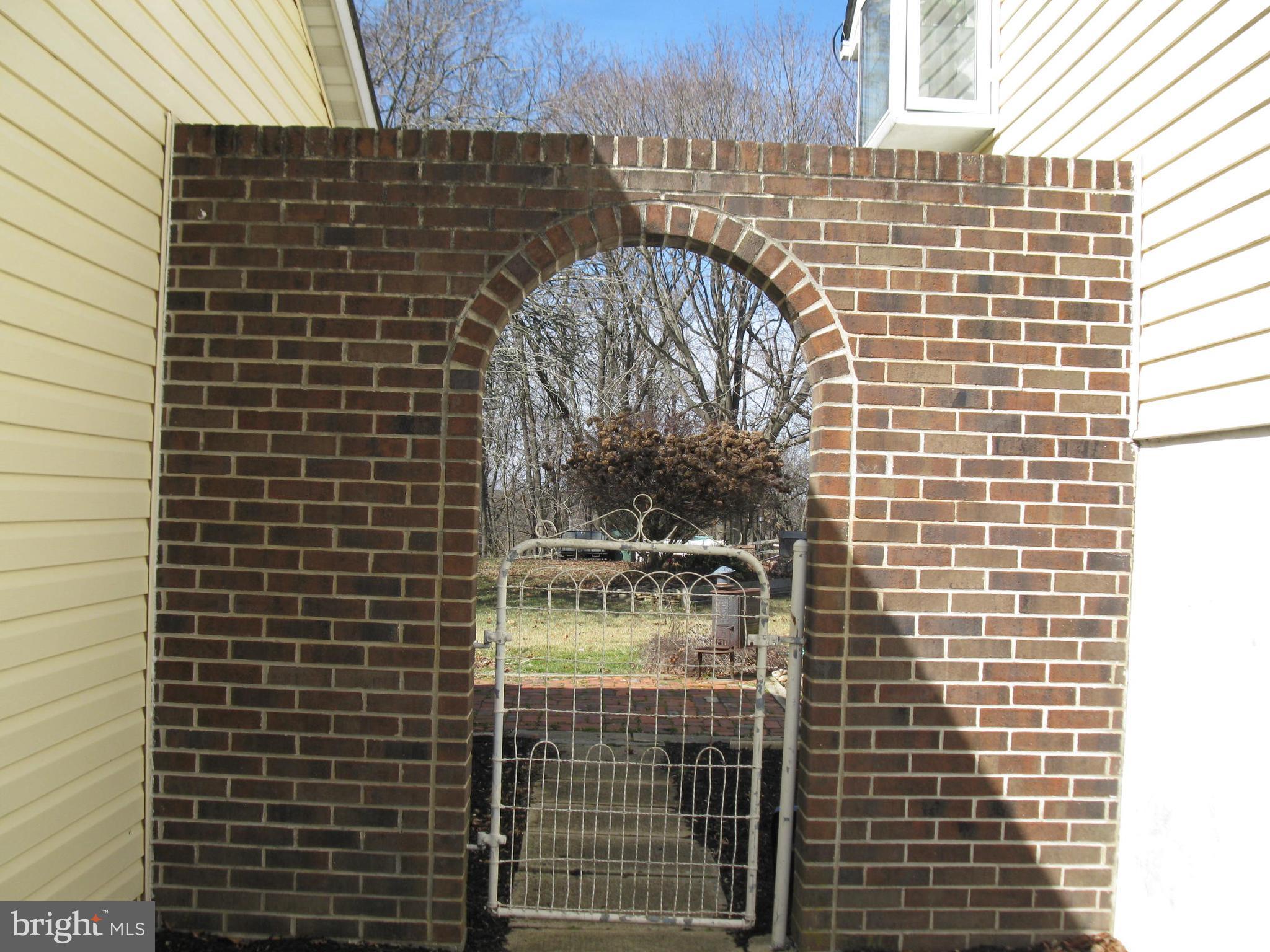 106 White Hall Road Elkton, MD 21921 - Photo 3 of 29 left gate leads to back yard