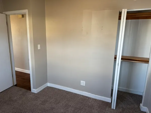 an empty room with closet