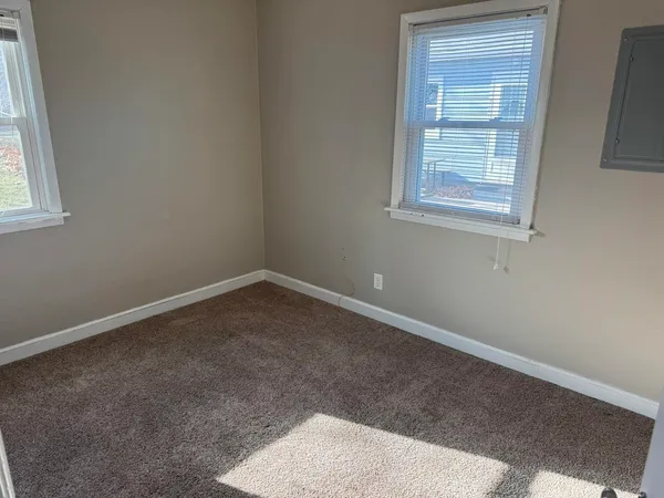 an empty room with a window