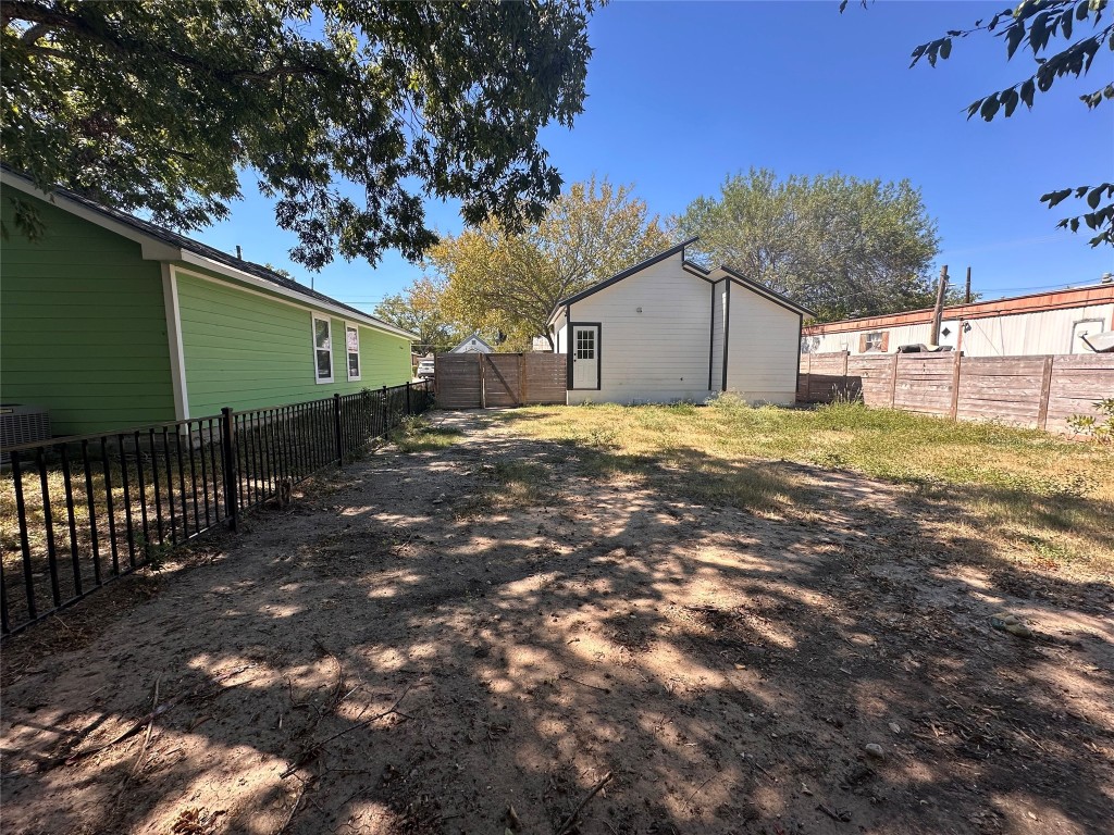 720 Neches Street Lockhart, TX 78644 - Photo 11 of 12 View of fenced backyard