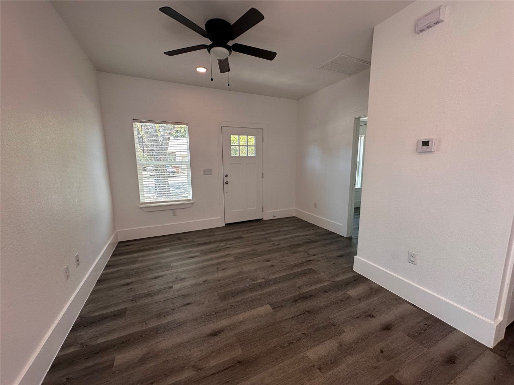 720 Neches Street Lockhart, TX 78644 - Photo 2 of 12 Entrance foyer with dark wood-style floors, recessed lighting, and ceiling fan