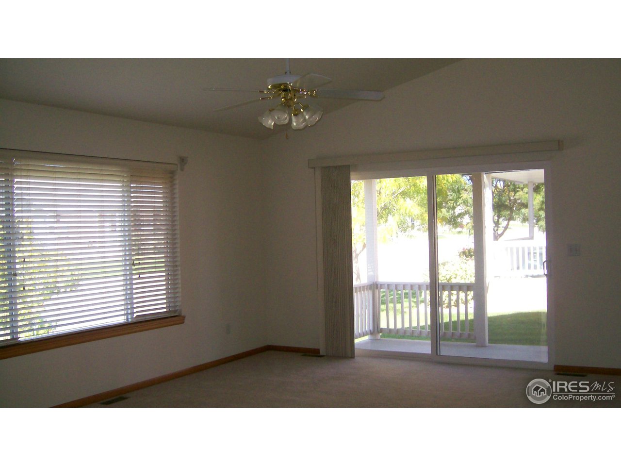3597 West 21st Street Road Greeley, CO 80634 - Photo 11 of 12 a black and white photo of a living room