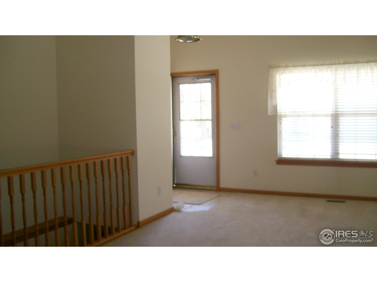 3597 West 21st Street Road Greeley, CO 80634 - Photo 10 of 12 a open kitchen with a window
