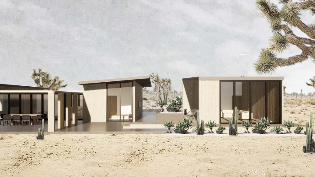 63974 Sun Mesa Road Joshua Tree, CA 92252 - Photo 1 of 5 a view of a backyard of a house