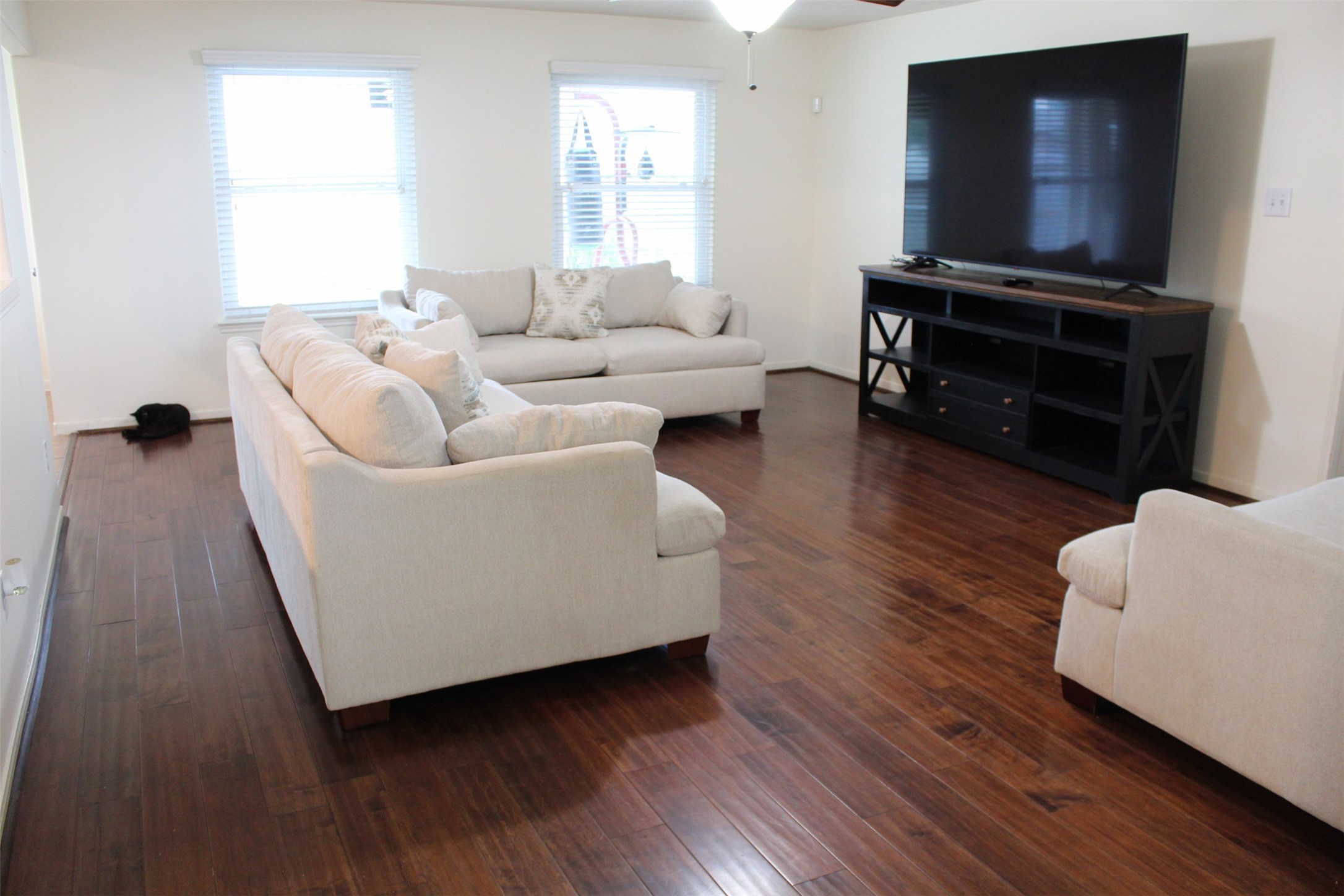 Open concept layout. Living room area opens to the kitchen , and breakfast nook.  Plenty of natural lighting.