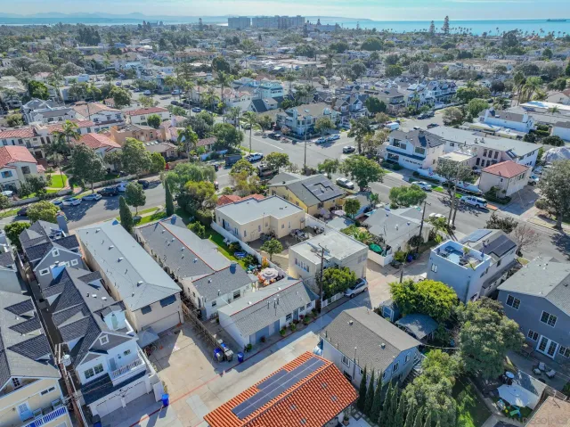 an aerial view of a city with lots of residential buildings