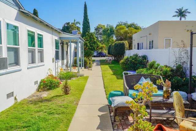 a view of yard with patio