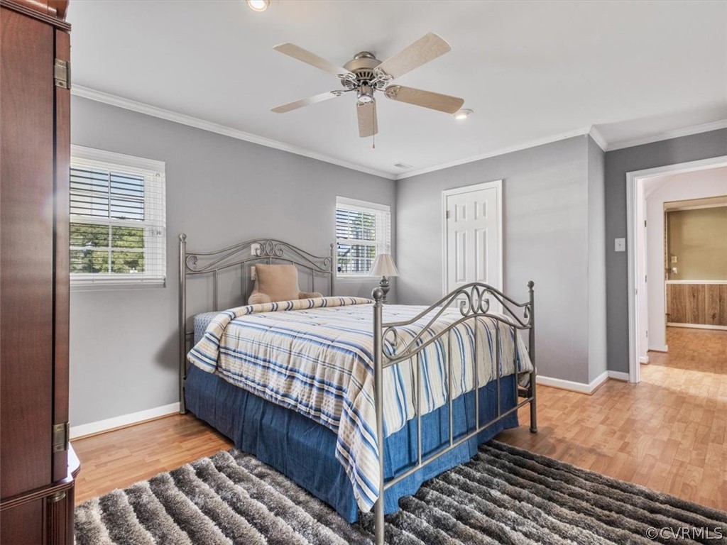 6601 Brambleton Road Chesterfield, VA 23832 - Photo 19 of 34 a bedroom with bed and window