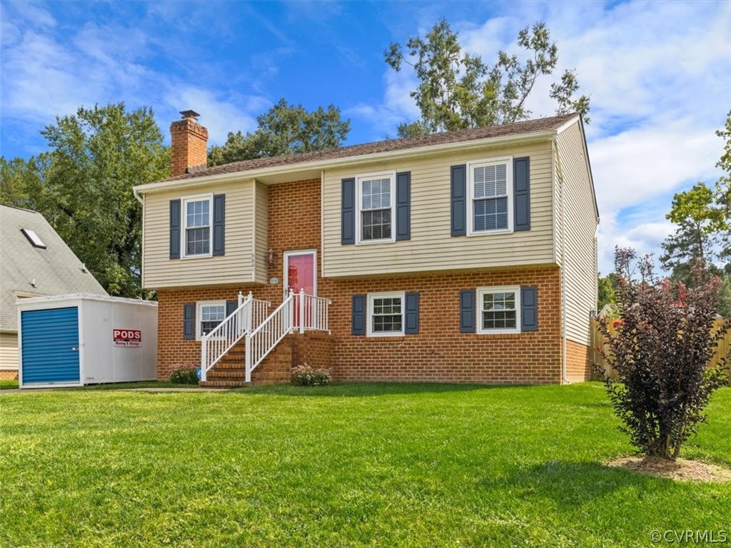 6601 Brambleton Road Chesterfield, VA 23832 - Photo 2 of 34 a view of a house with a backyard