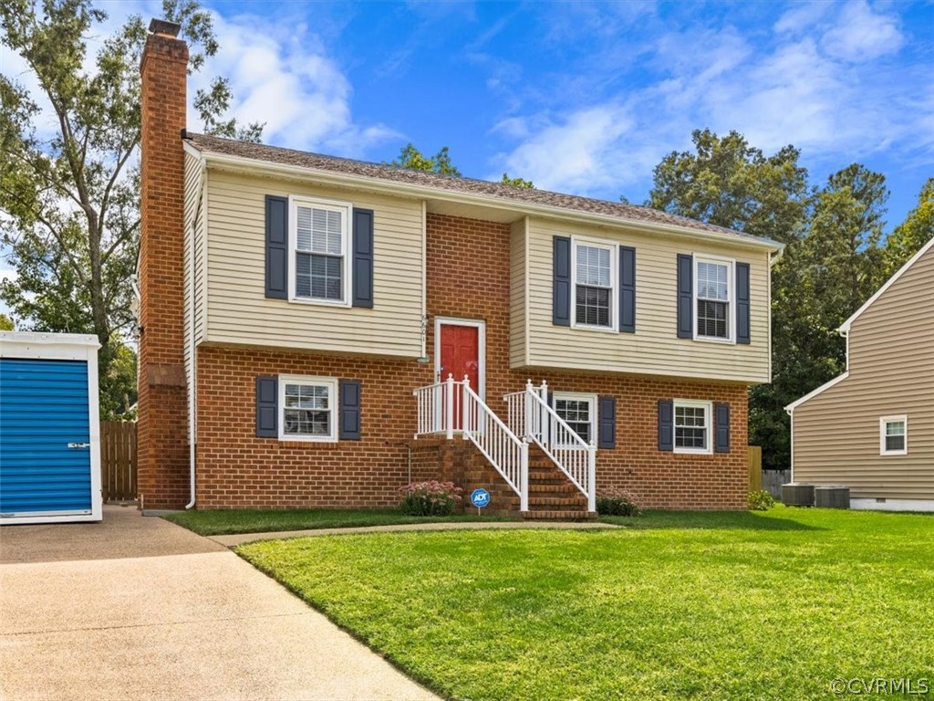 6601 Brambleton Road Chesterfield, VA 23832 - Photo 3 of 34 a view of a house with a yard