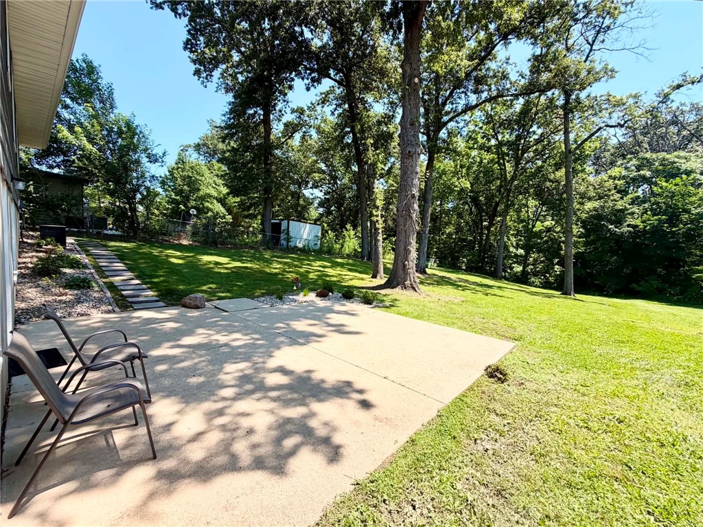 1108 South 3rd Street Effingham, IL 62401 - Photo 25 of 29 a view of a yard with plants and trees
