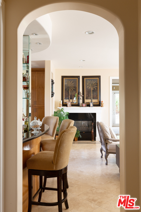 24533 Desert Avenue Newhall, CA 91321 - Photo 15 of 48 a living room with furniture and a table