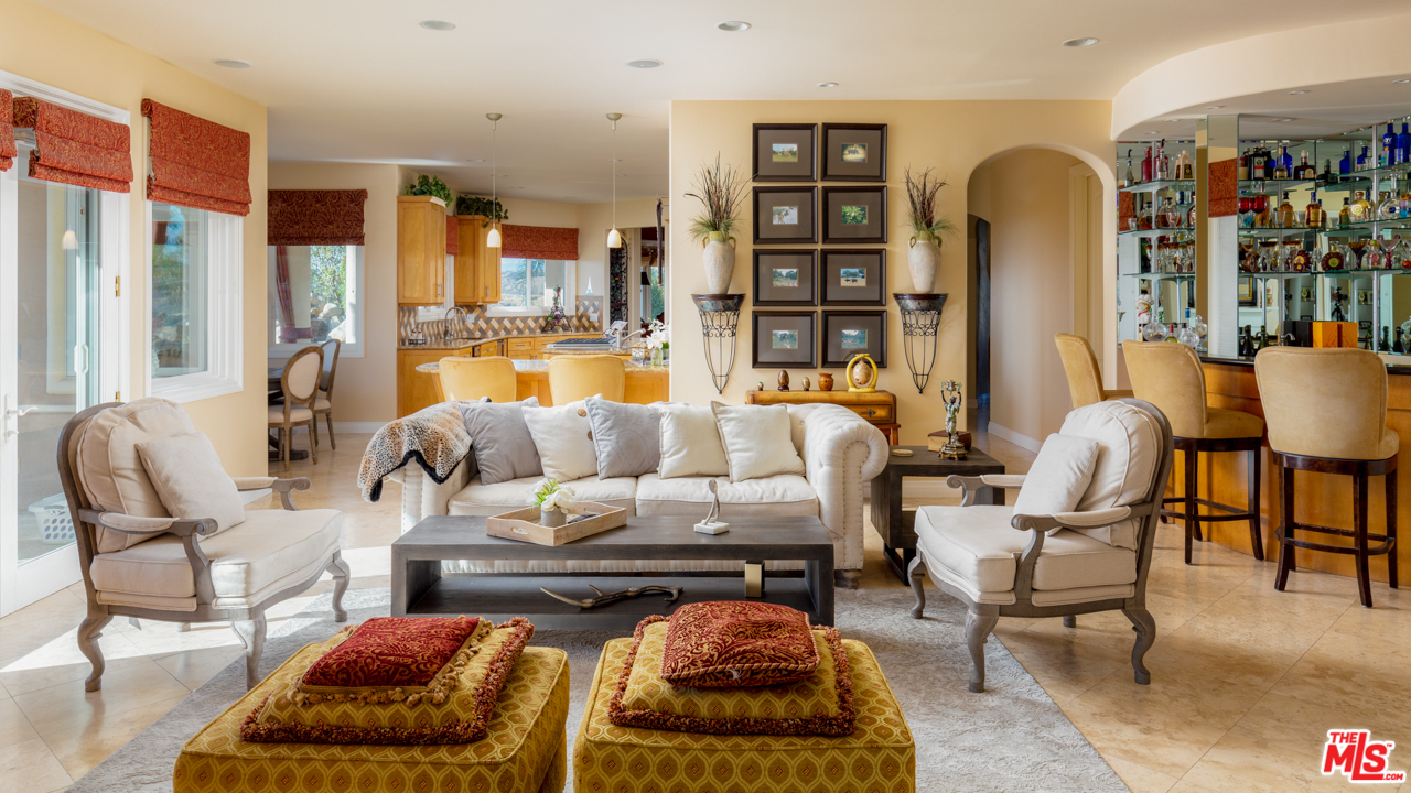 24533 Desert Avenue Newhall, CA 91321 - Photo 17 of 48 a living room with furniture and a book shelf