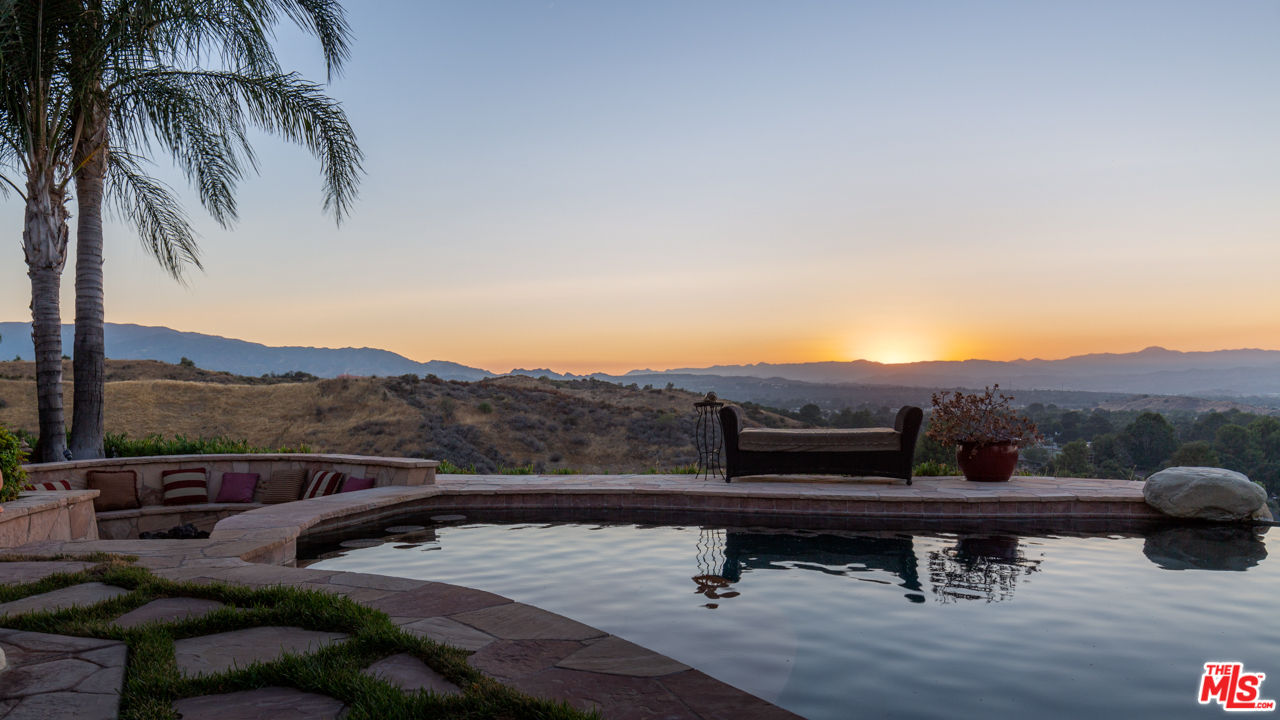 24533 Desert Avenue Newhall, CA 91321 - Photo 45 of 48 a view of an outdoor sitting area with furniture
