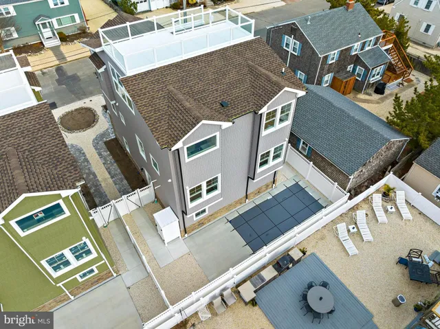 a kitchen with a sink a stove a refrigerator and island