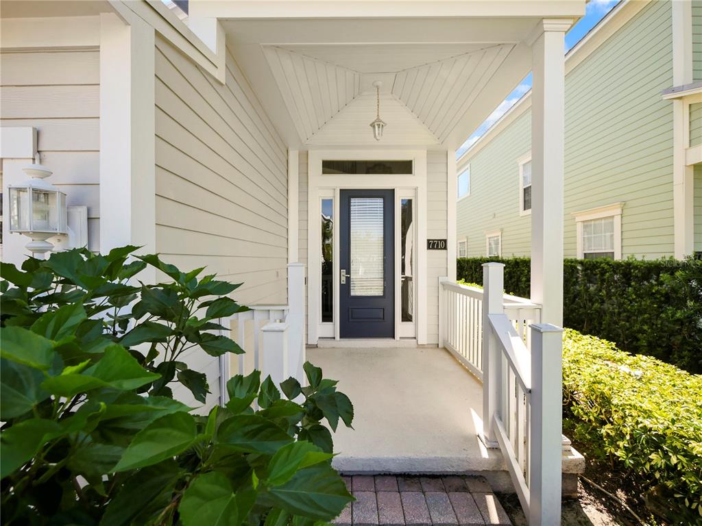 7710 Linkside Loop Reunion, FL 34747 - Photo 14 of 33 a front view of a house with a yard