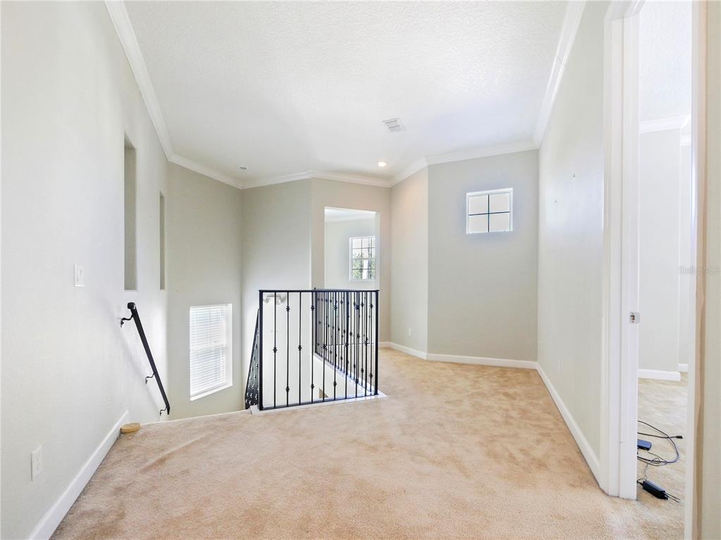 7710 Linkside Loop Reunion, FL 34747 - Photo 32 of 33 a view of a hallway