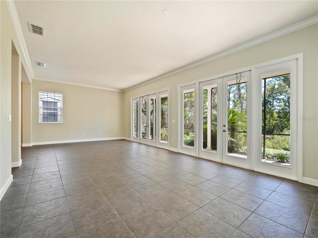 7710 Linkside Loop Reunion, FL 34747 - Photo 4 of 33 a view of an empty room with a window