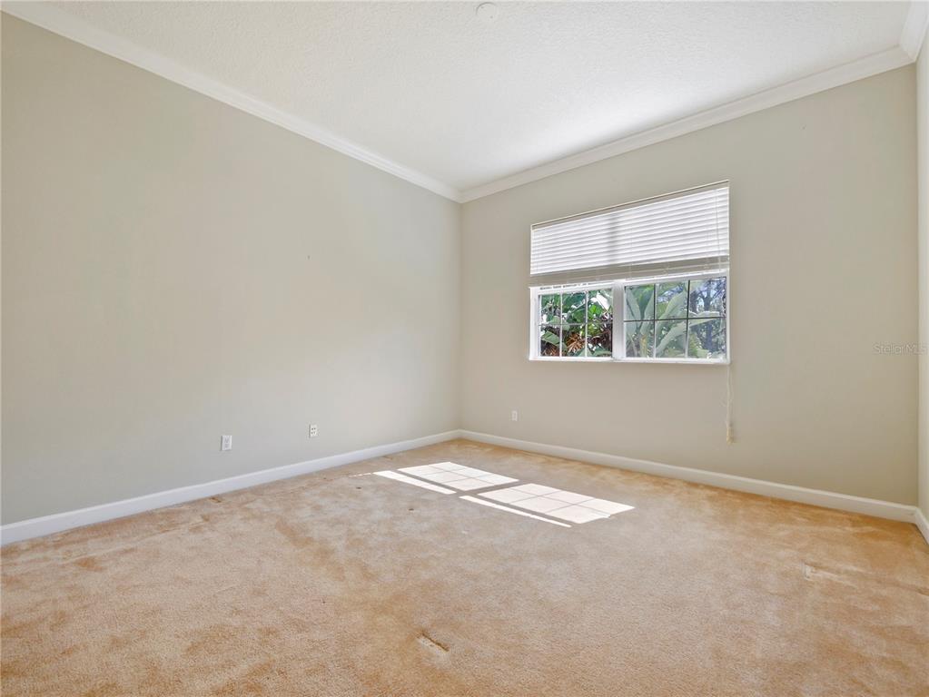 7710 Linkside Loop Reunion, FL 34747 - Photo 6 of 33 an empty room with windows