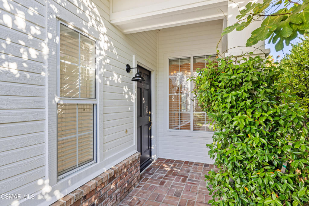 2906 Evesham Avenue Thousand Oaks, CA 91362 - Photo 3 of 30 a view of a house with a yard