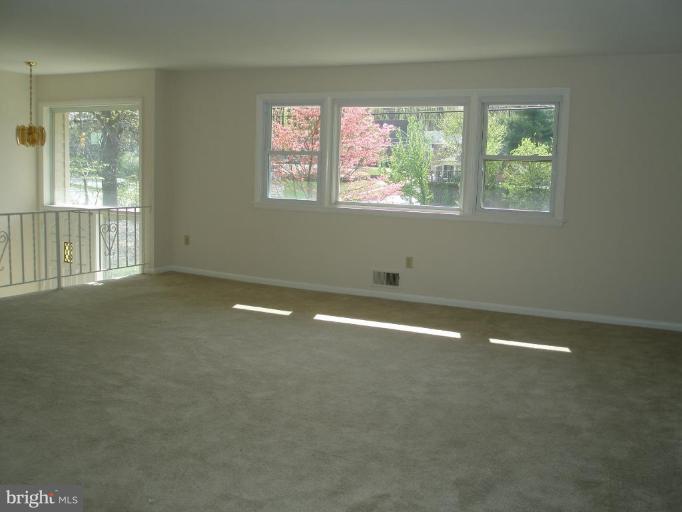 13001 Layhill Road Silver Spring, MD 20906 - Photo 3 of 19 a view of an empty room with a window