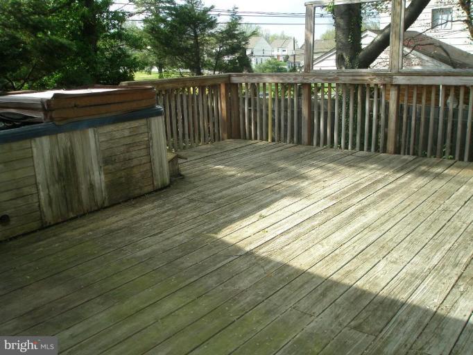 13001 Layhill Road Silver Spring, MD 20906 - Photo 8 of 19 a balcony with wooden floor