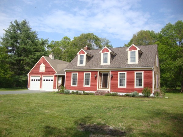 228 Braley Hill Road Rochester, MA 02770 - Photo 1 of 18 front view of a house with a yard