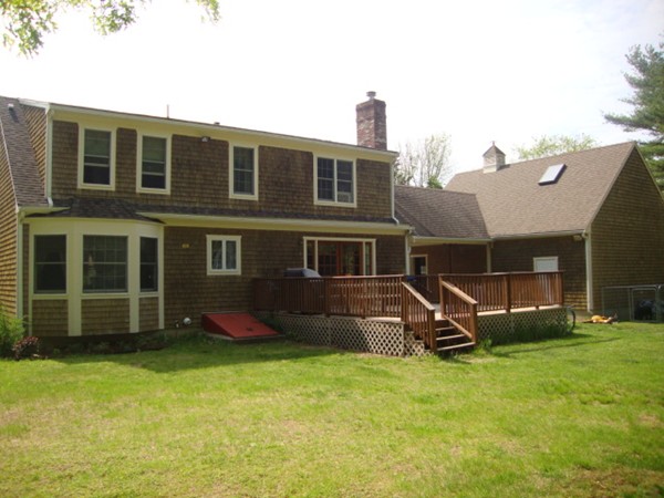 228 Braley Hill Road Rochester, MA 02770 - Photo 2 of 18 a view of a house with a yard and sitting area