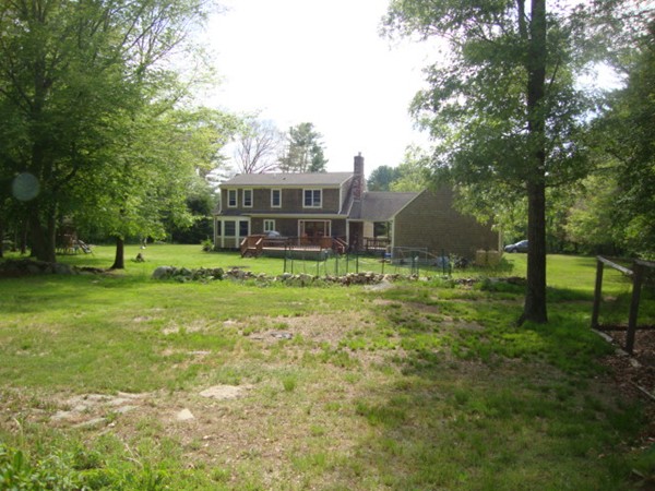 228 Braley Hill Road Rochester, MA 02770 - Photo 5 of 18 a view of a house with a yard
