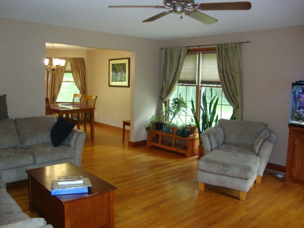 228 Braley Hill Road Rochester, MA 02770 - Photo 9 of 18 a living room with furniture and a large window