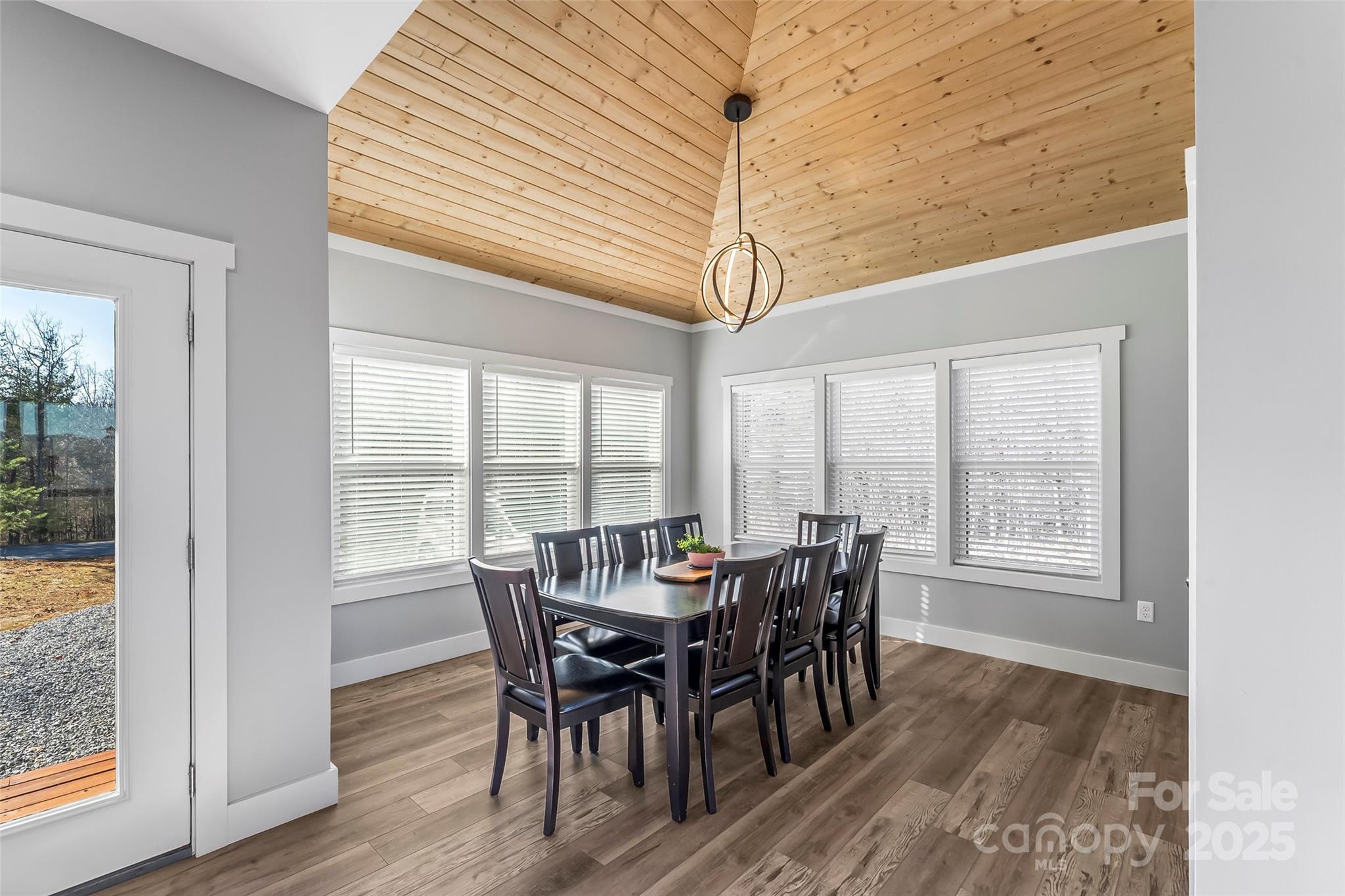 53 Cres Ridge Lane Nebo, NC 28761 - Photo 15 of 48 a view of a dining room with furniture window and wooden floor